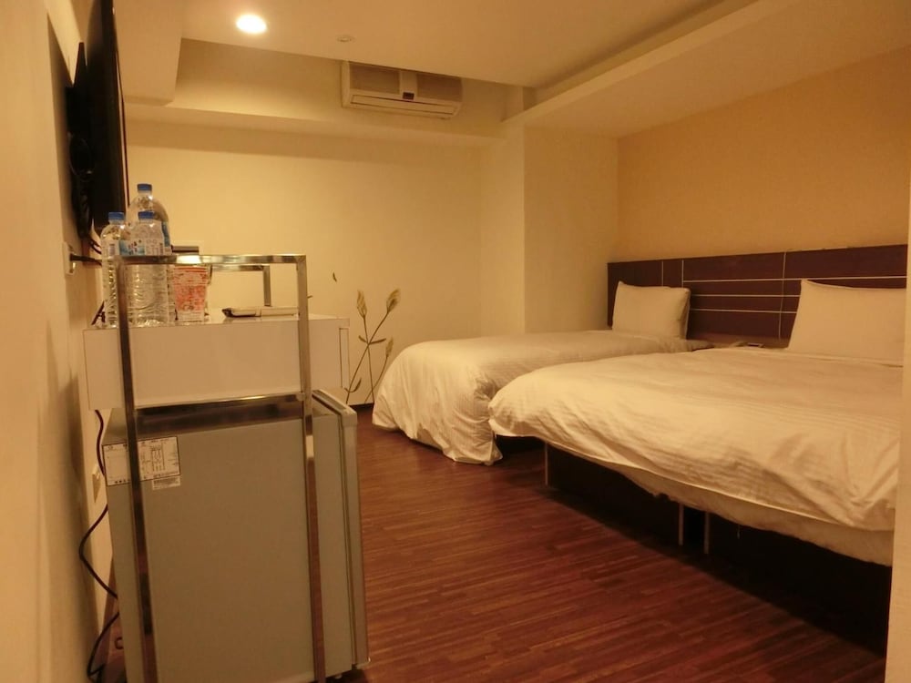 Фото Jhong-Sing Hotel