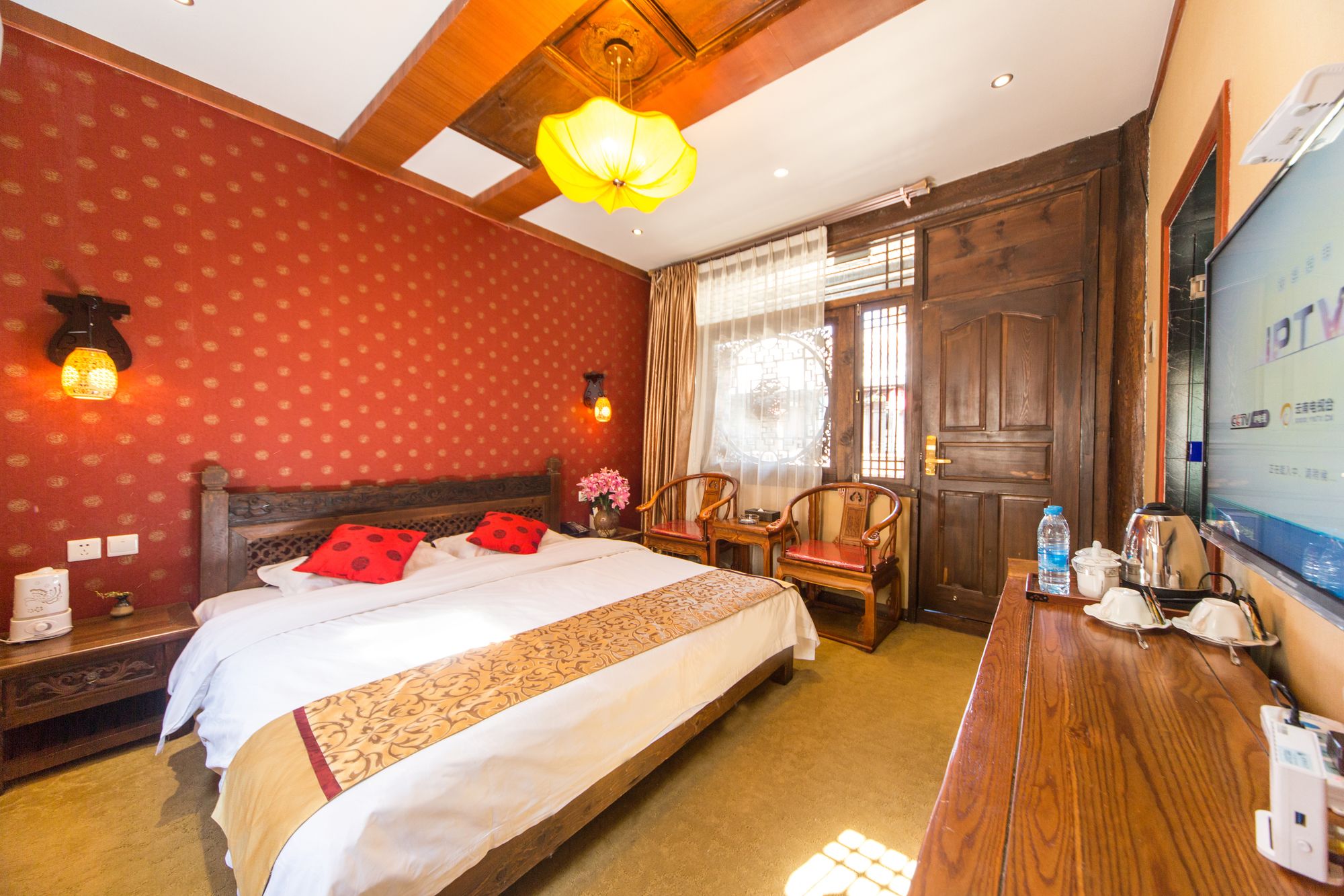 Фото Li Jiang Hemuju Inn