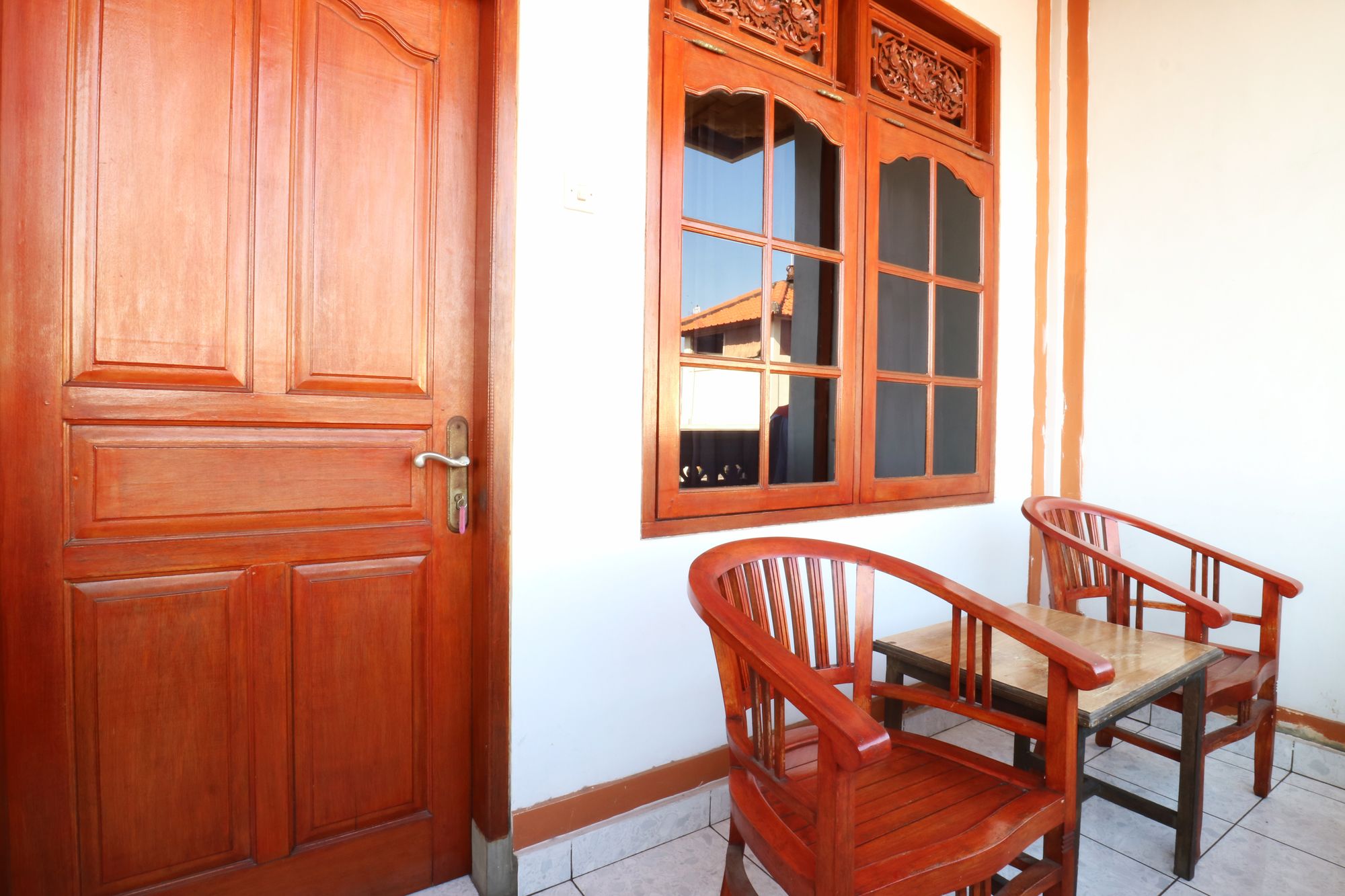 Фото Taman Mekar Beach Inn 2