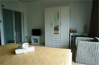 Фото Corner Cafe Bed and Breakfast