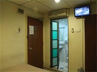 Фото Oyo 615 Dragon Inn Premium Hotel