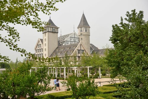 Внешний вид отеля Hilton Yantai Golden Coast в Яньтае, фото 2