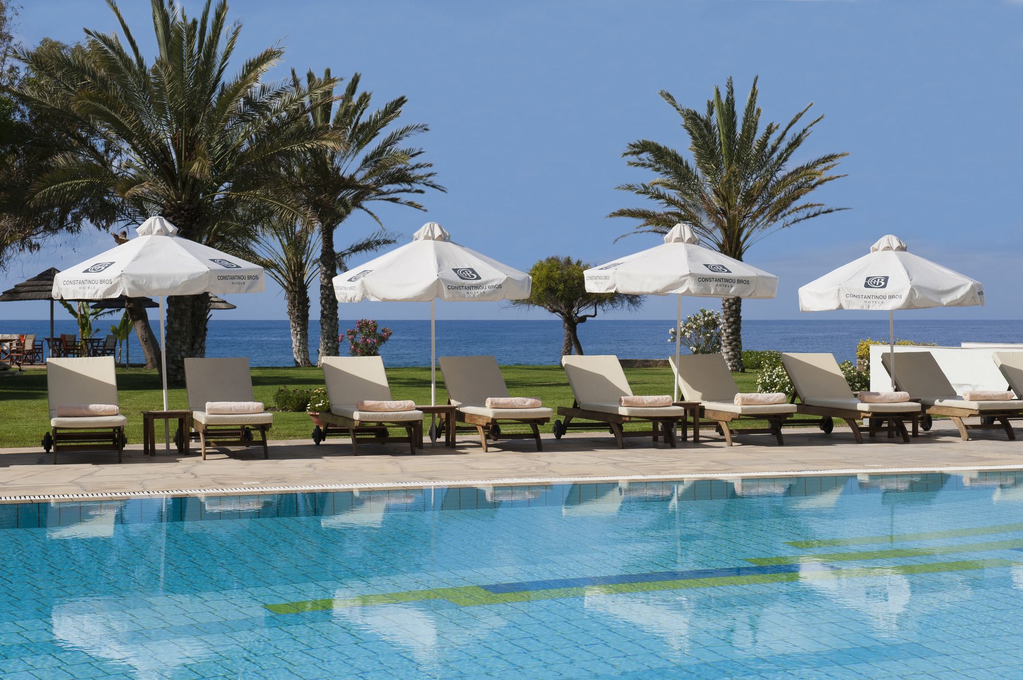 Фото Constantinou Bros Athena Royal Beach Hotel