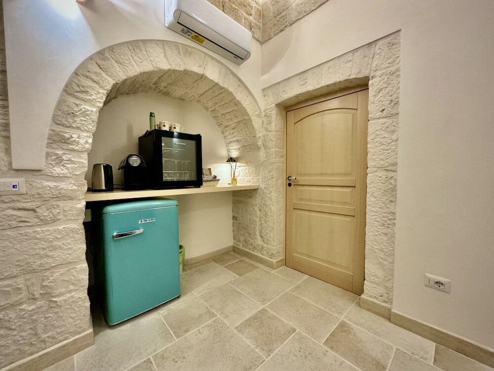 Фото Trulli Contento Rooms E Apartments