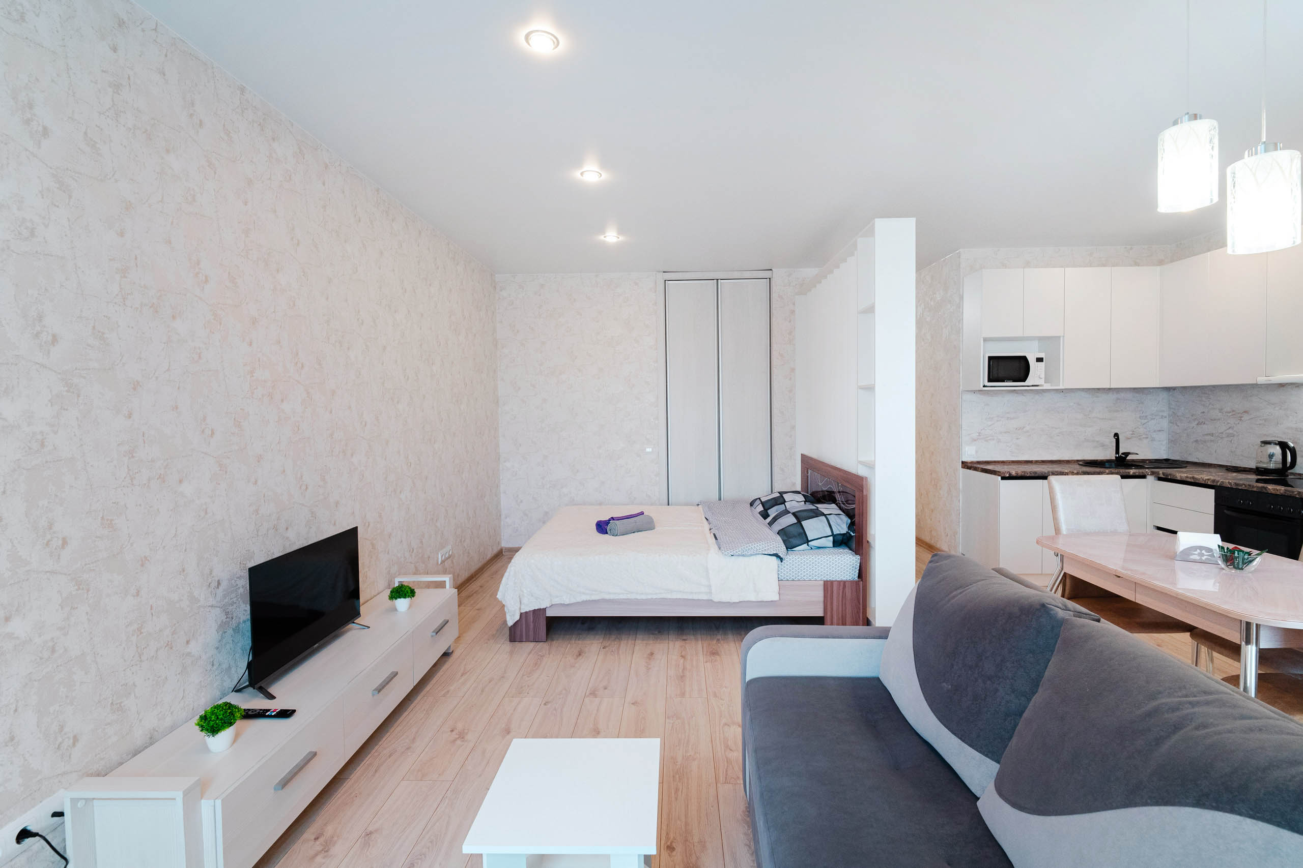 Фото Happy House Уютная квартира-студия в центре Левобережья