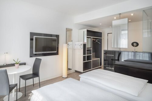 Внешний вид отеля INNSiDE by Meliá Frankfurt Ostend в Франкфурте-на-Майне, фото 2