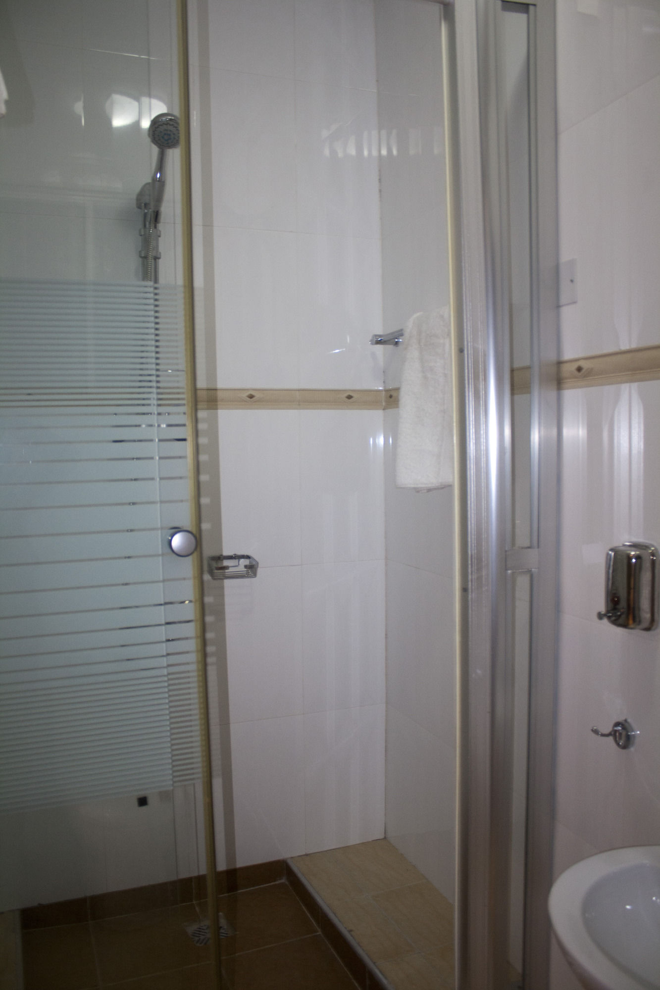 Фото At Home Boutique Hostel and Suite