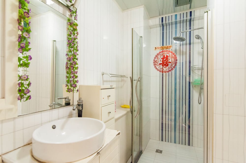 Фото Tianjin Xinyi Apartment Hotel