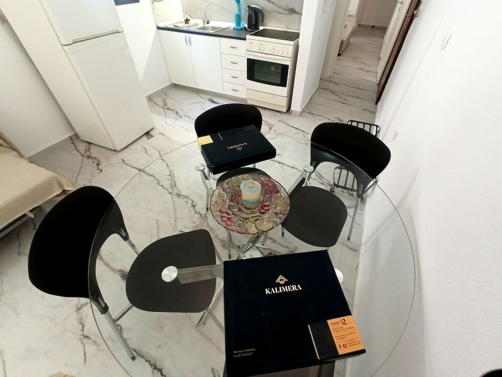 Фото Salonikiou Beach Deluxe Apartments