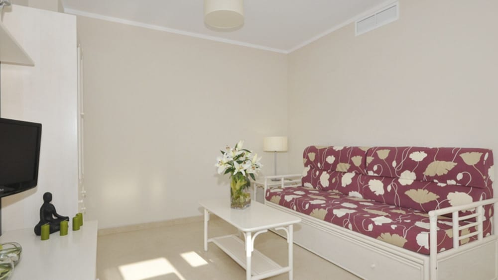 Фото Apartamentos Larimar