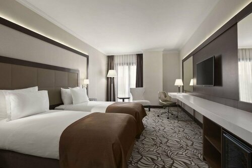 Гостиница Ramada Hotel & Suites by Wyndham Istanbul Merter в Гюнгерене