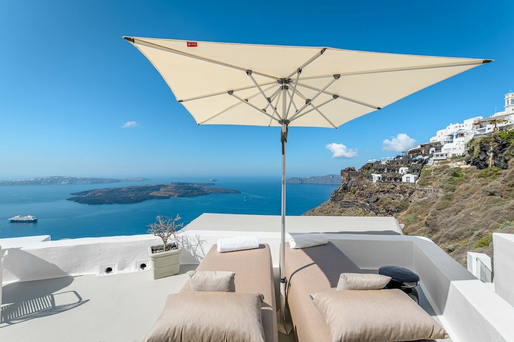 Фото Iconic Santorini by Sandglass