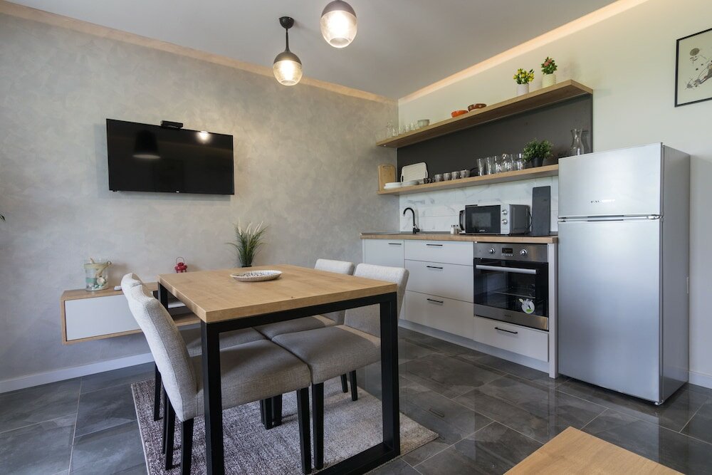 Фото Deluxe Feliciano Apartments