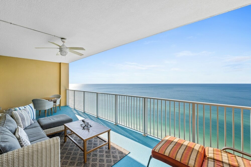 Фото Tropic Winds by Book That Condo