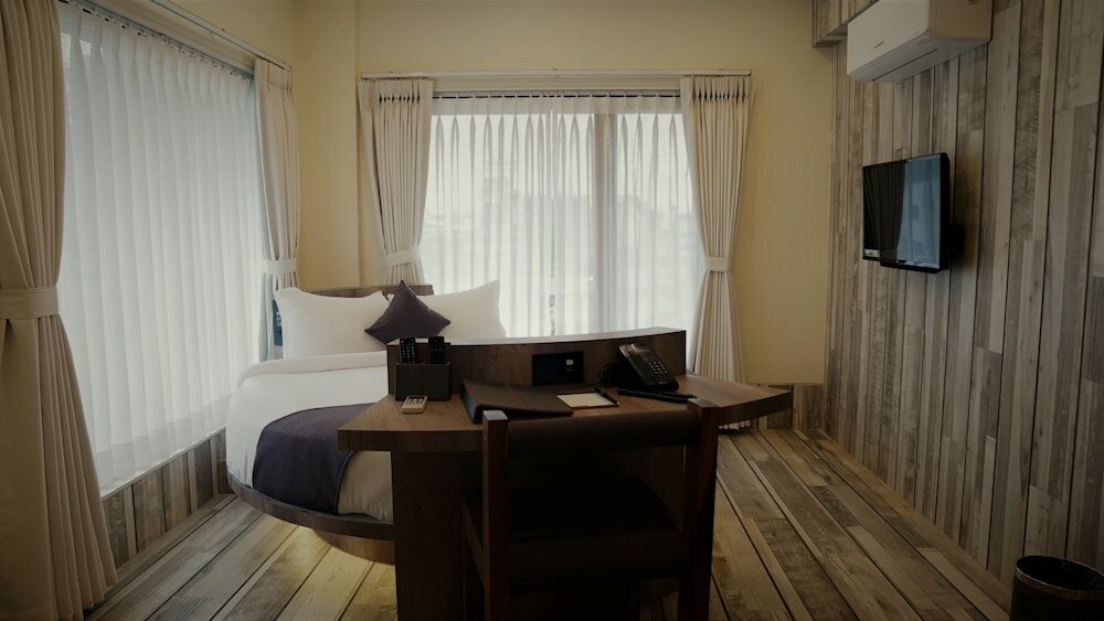 Фото De Glance Hotel