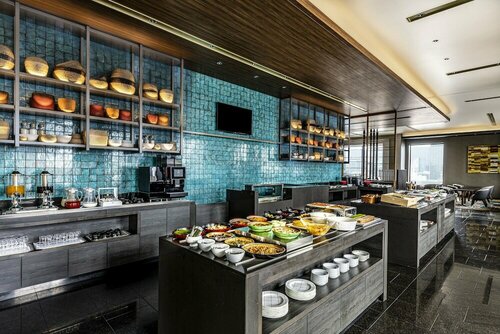 Гостиница The Royal Park Hotel Iconic Osaka Midosuji в Осаке
