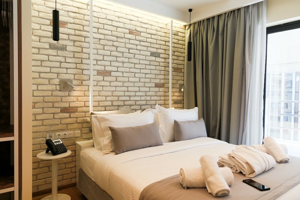 Фото Suites Syngrou Fix