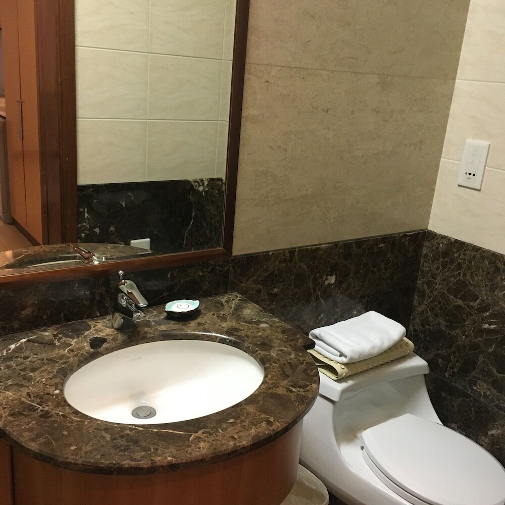 Фото Dalian Asia Pacific Service Apartment