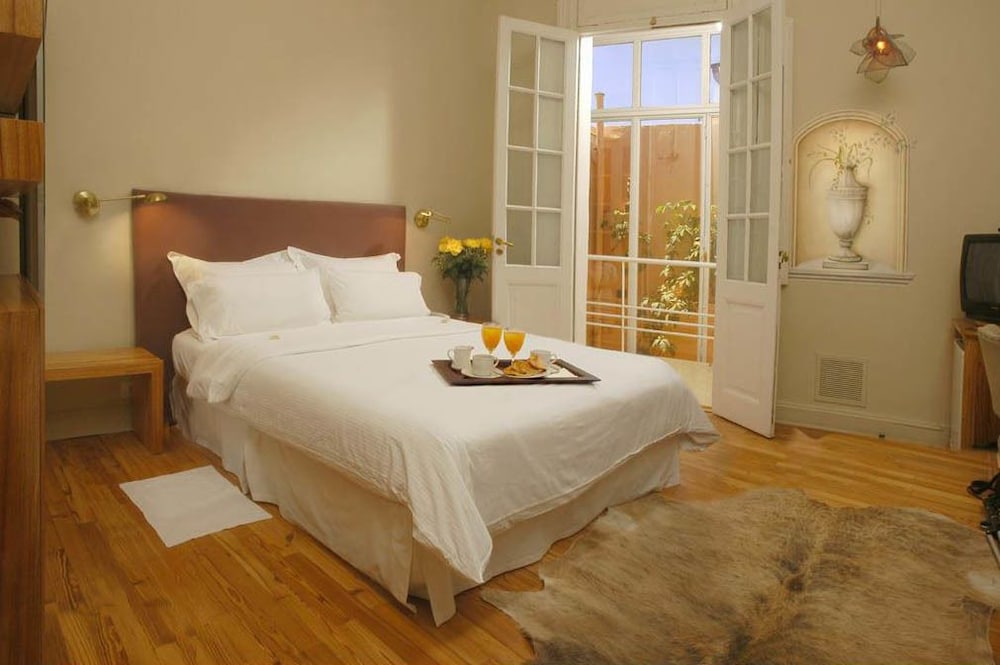 Фото 1555 Malabia House Hotel