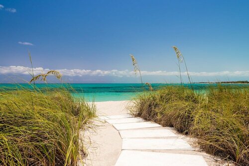 Гостиница Grace Bay Club на Тёрксе и Кайкосе