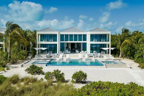 Гостиница Grace Bay Club на Тёрксе и Кайкосе