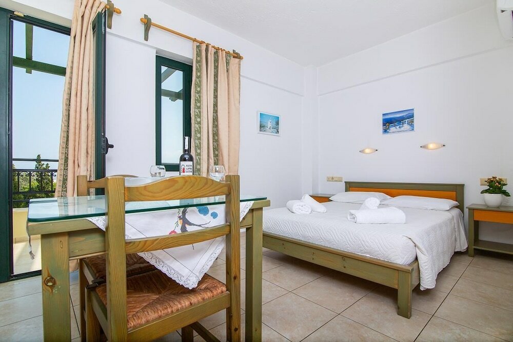 Фото Dionysos Apartments & Studios