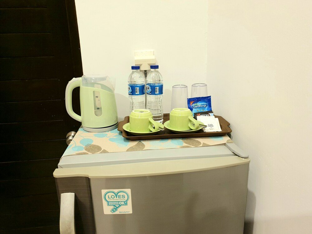 Фото Comfy Room in Piliau Residence