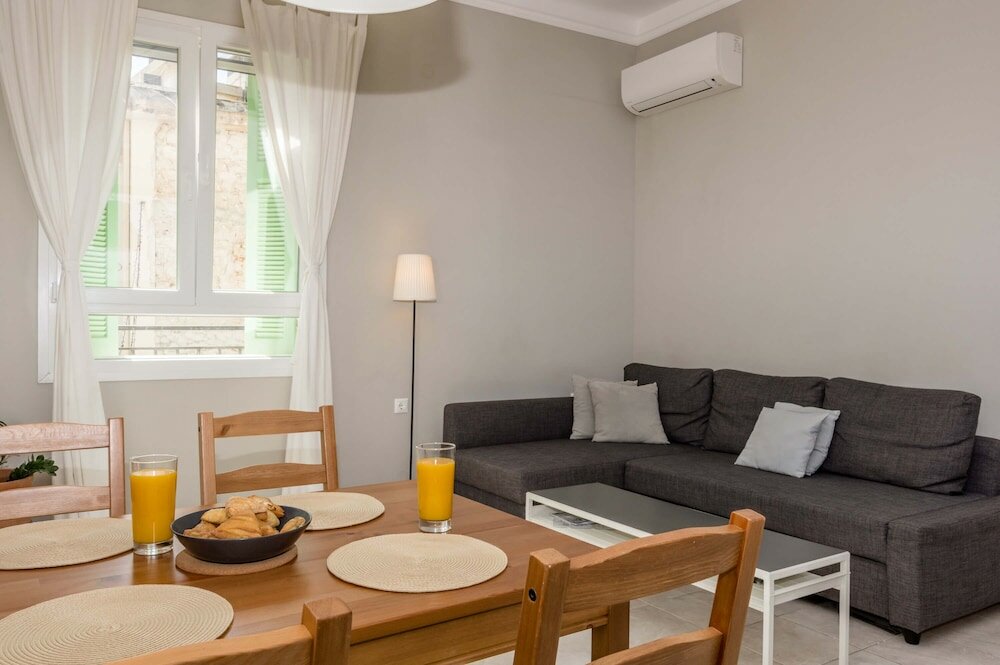 Фото The Central Boutique Αpartments