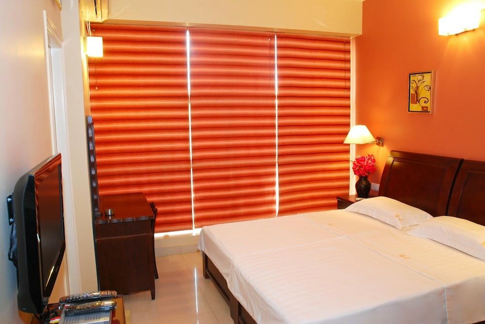 Фото Parkwood Suites