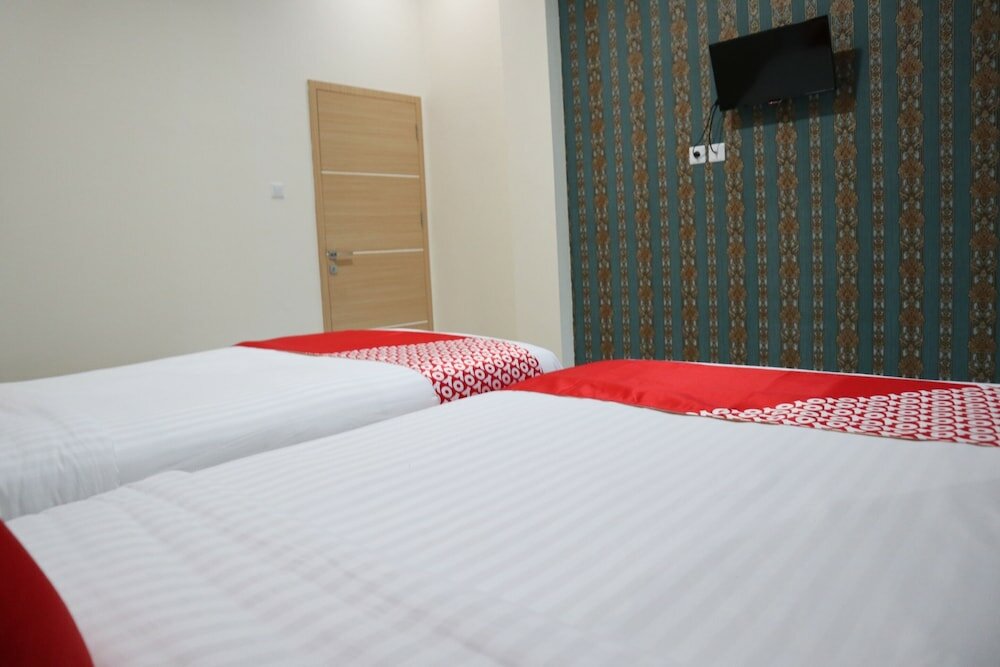 Фото Oyo 1648 Penginapan Three Joye