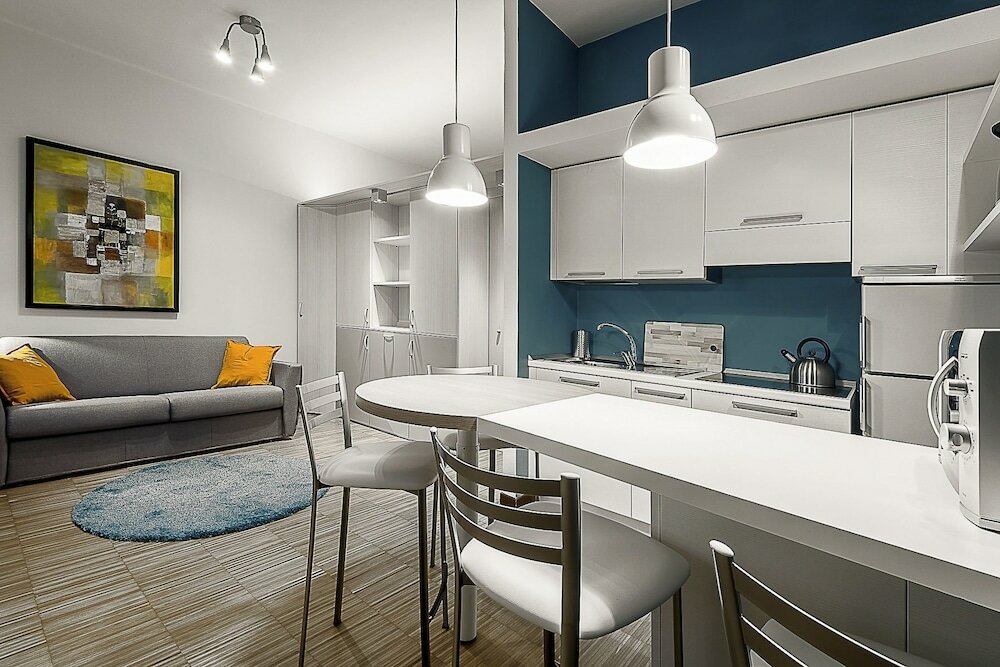 Фото Shortstays Design Loft Broglio 2