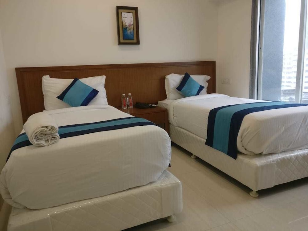 Фото Mint Magna Suites