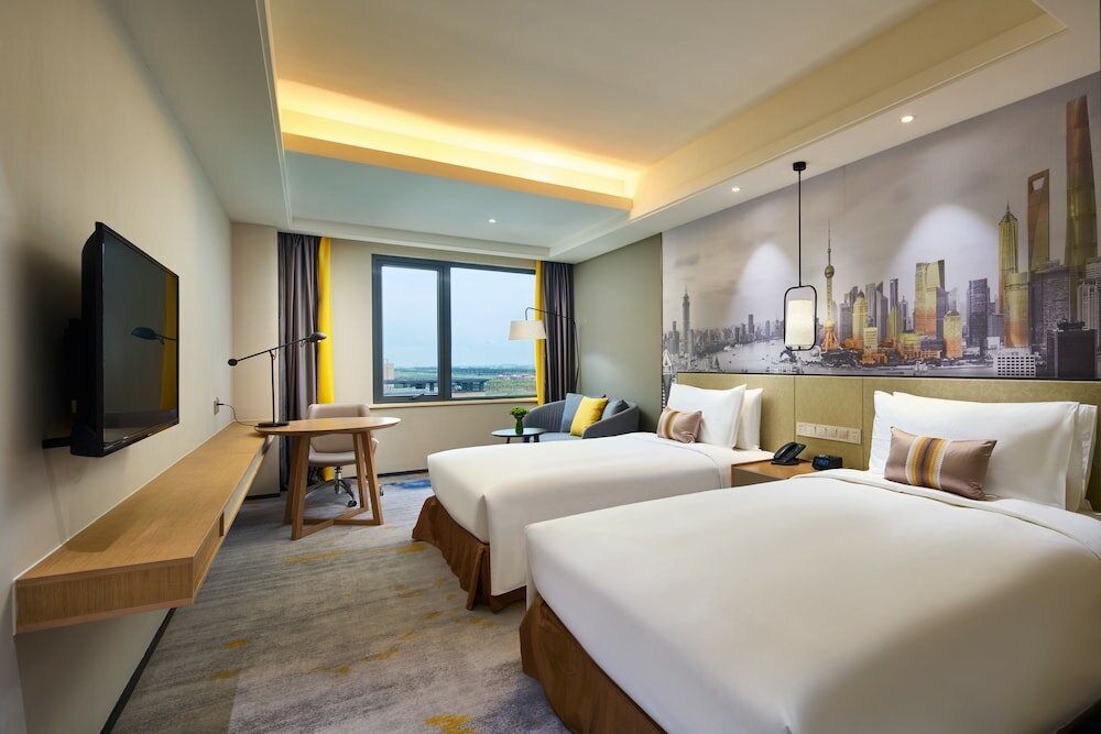 Фото The Qube Hotel Shanghai Sanjiagang