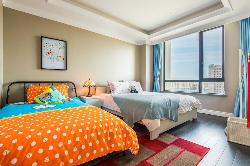 Фото Shanghai Xinchuan Boutique Apartment