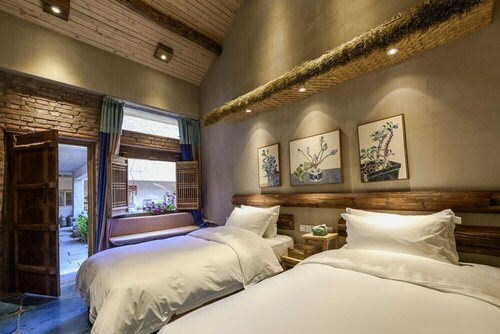 Гостиница Lotus Mountain Boutique Inn