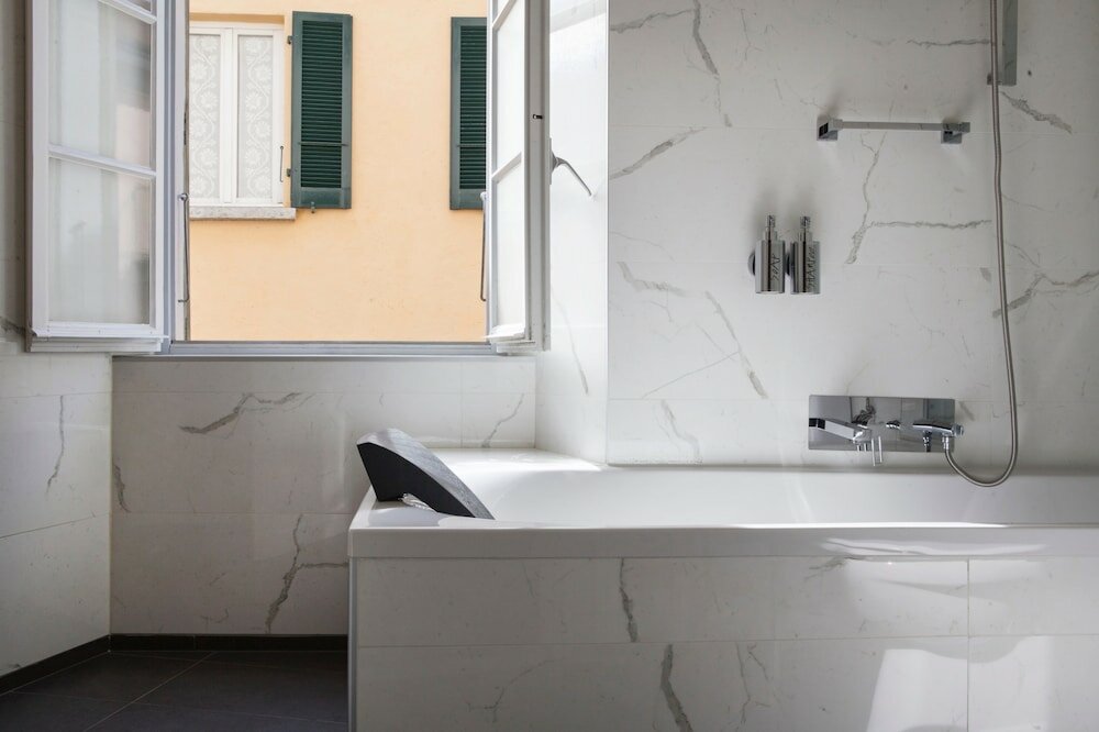 Фото Caffè dell'Arte Boutique Rooms