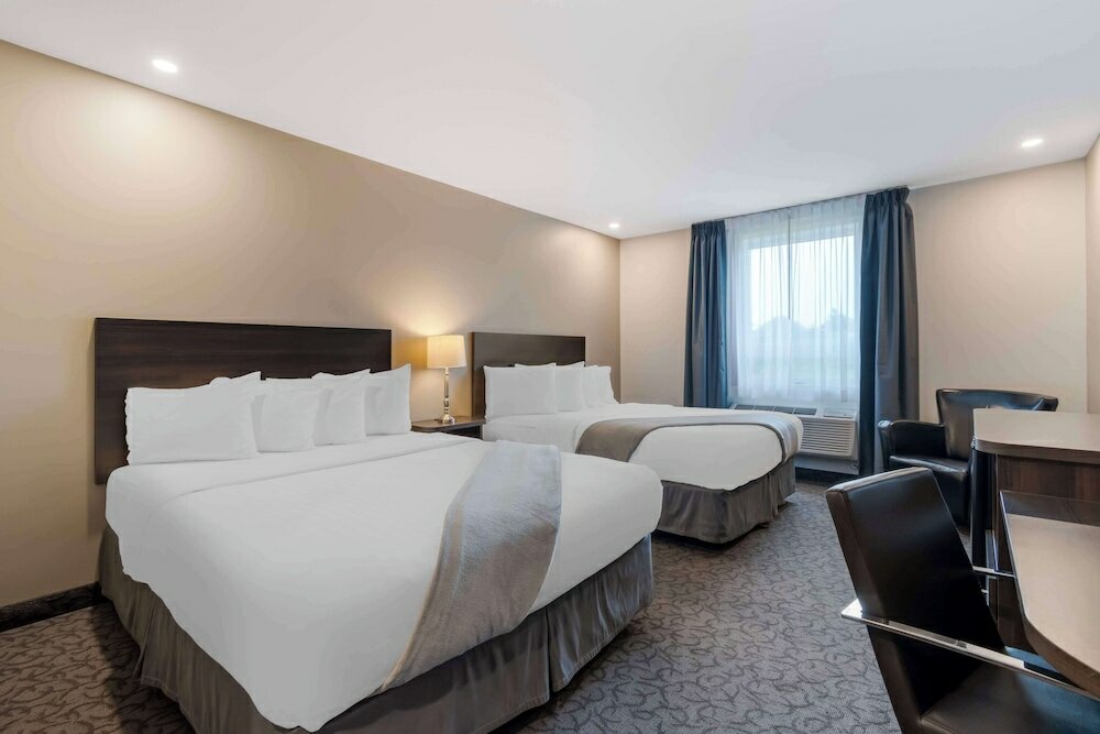 Фото Villa Inn & Suites SureStay Collection by Best Western