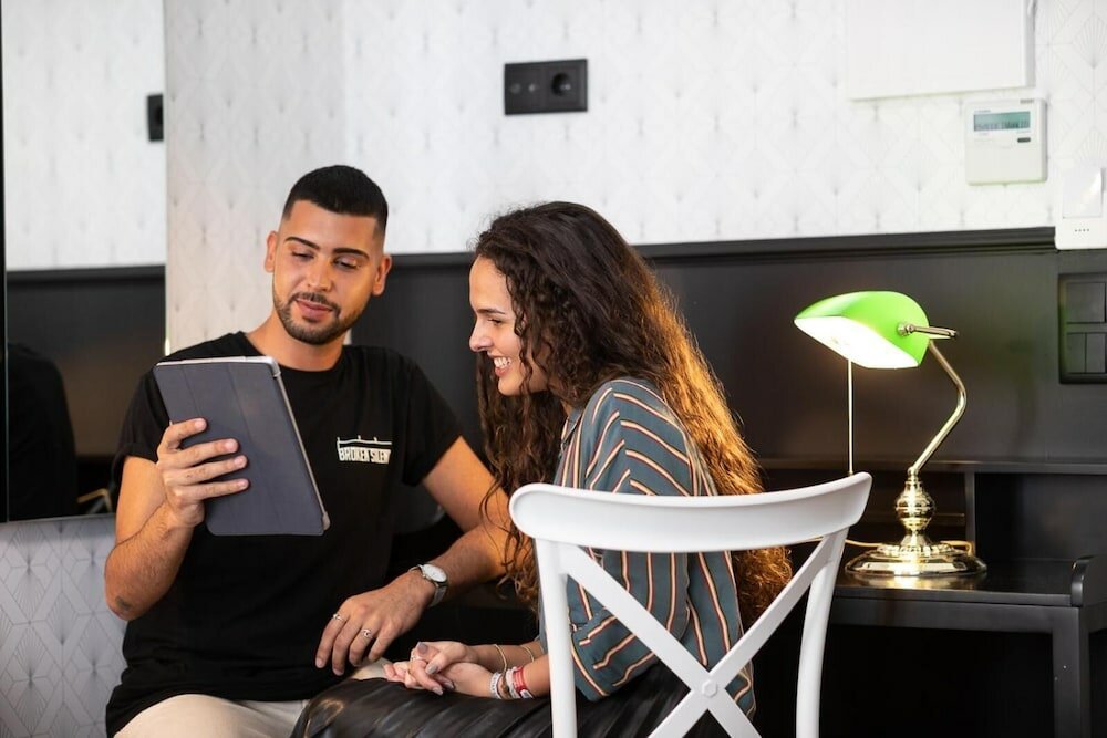 Фото The Twenties Rooms & Suites