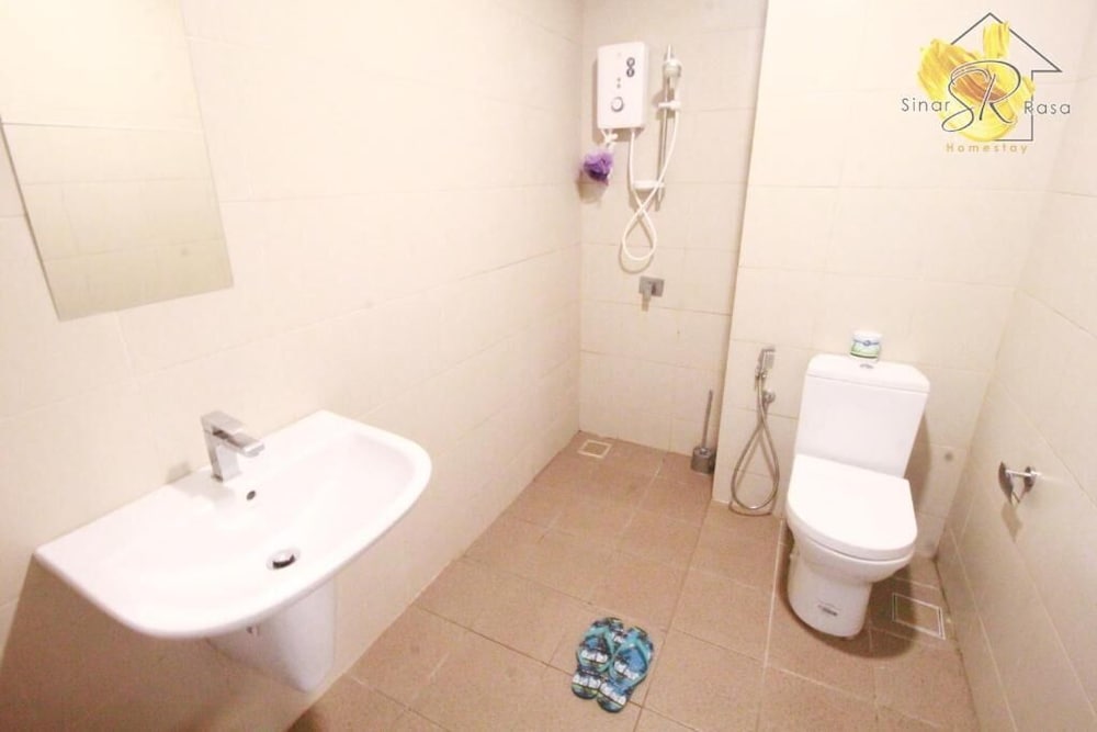 Фото Sinar Rasa Homestay I-City I-Soho