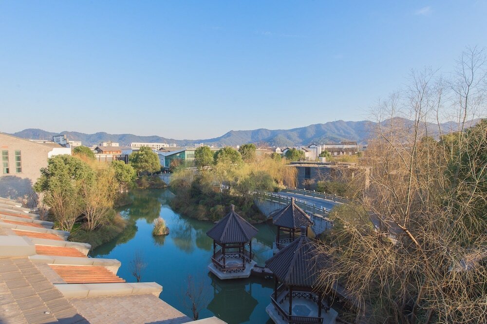 Фото Sheraton Grand Hangzhou Wetland Park Resort