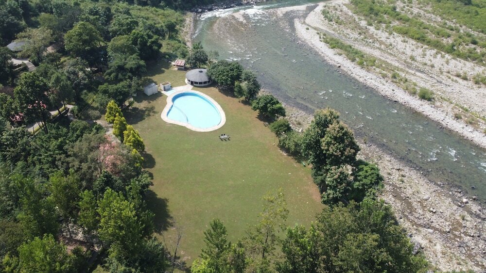 Фото WelcomHeritage Tarangi Ramganga Resort, Corbett