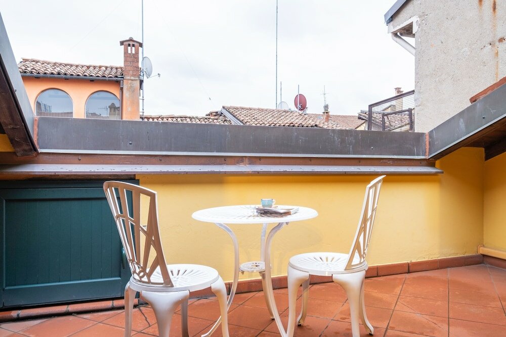 Фото Sognando tra i tetti bolognesi Apartment