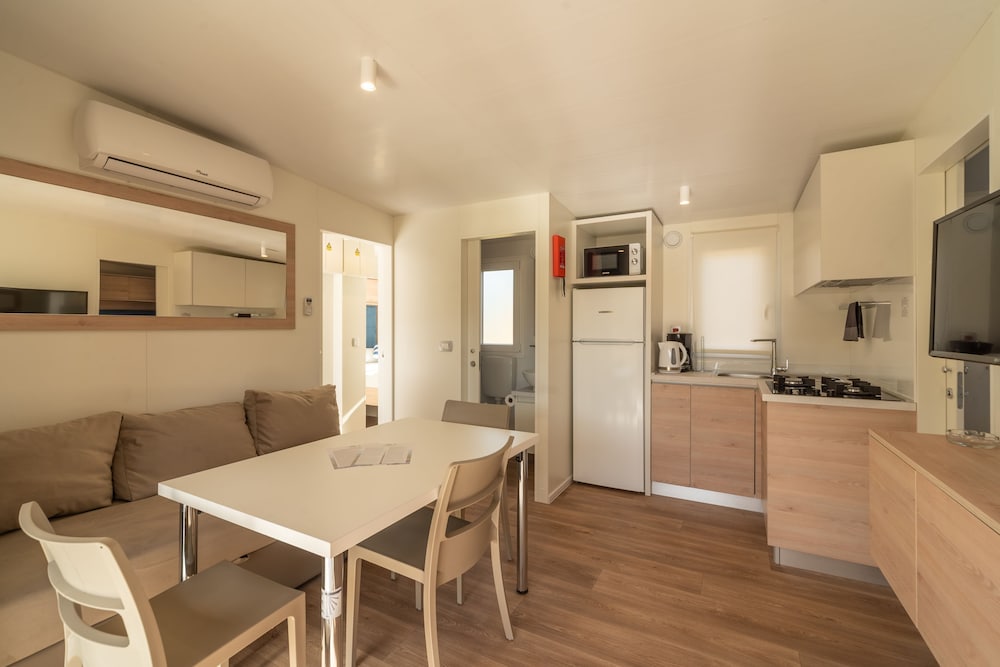 Фото Mediteran Mobile Homes Camping Park Umag