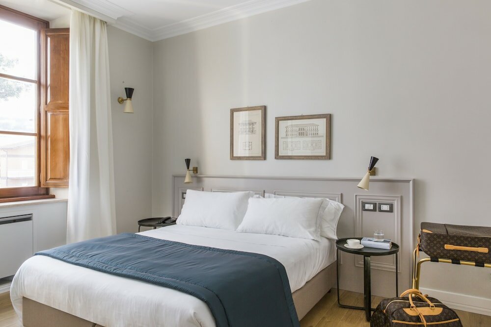 Фото Favilla Hotel di Charme