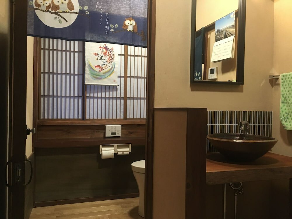 Фото Kominka Guesthouse Sudomari Tonami