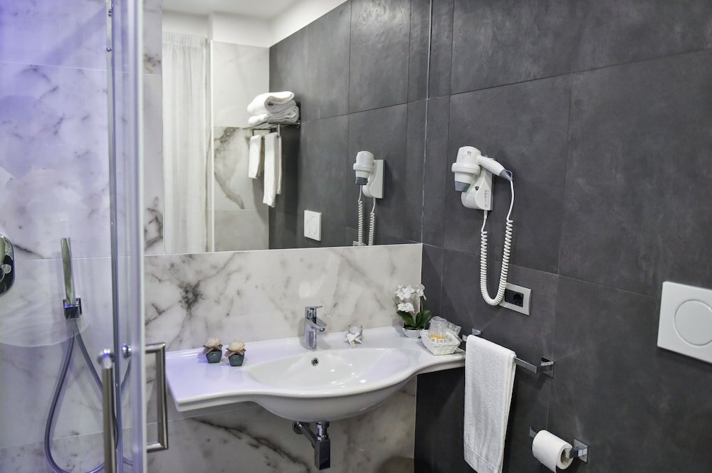 Фото Pompei Inn Ruins Luxury Suites