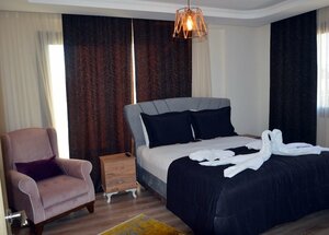 Menderes Butik Otel (İzmir, Menderes, Cüneytbey Mah., Doğan Sok., 59) ، فندق