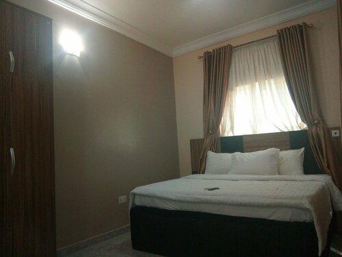 Гостиница Pameec Luxury Suites в Абудже