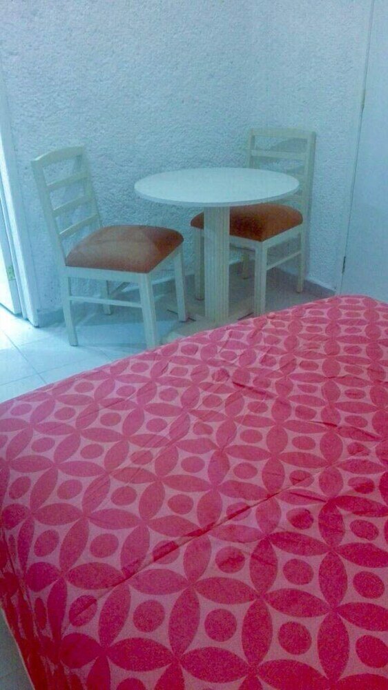 Фото Pok-Ta-Pok Guest House