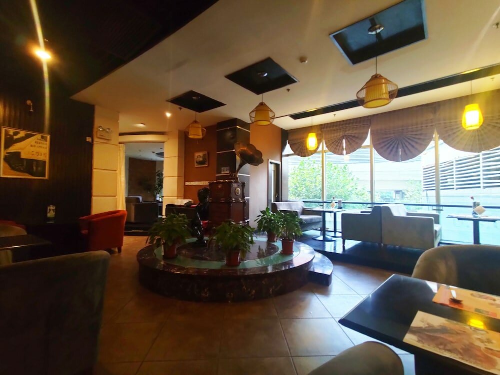 Фото Shanghai Yueyi Apartment Hotel